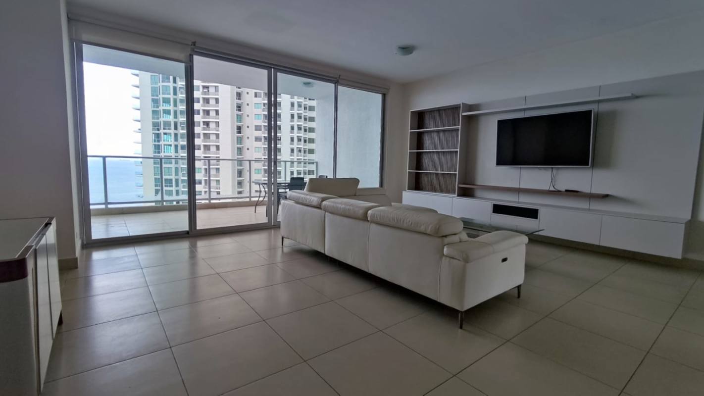 Bright living and dining area with sea views and balcony access at PH Dupont Punta Pacifica Panama City