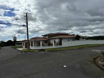 Large bedroom with tile floors and window view at Residencial Coquitos Hills, Panama
