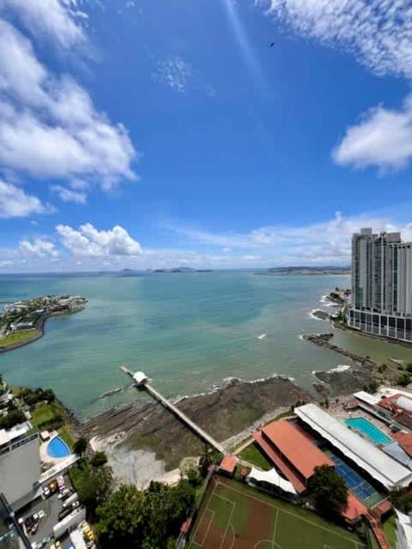 Aerial photo PH Aqualina tower oceanfront high-rise with pier and coastline in Panama City