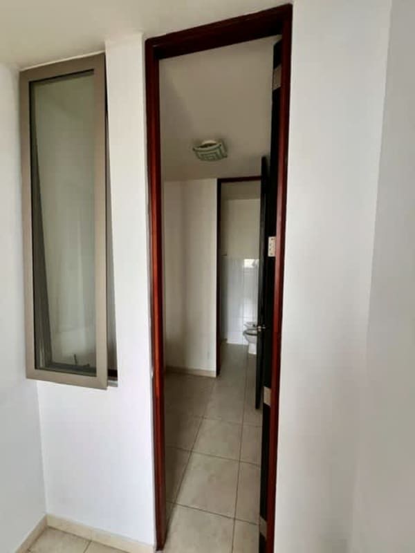 Open living space with marble floors and ocean-view balcony in PH Aqualina Punta Pacifica