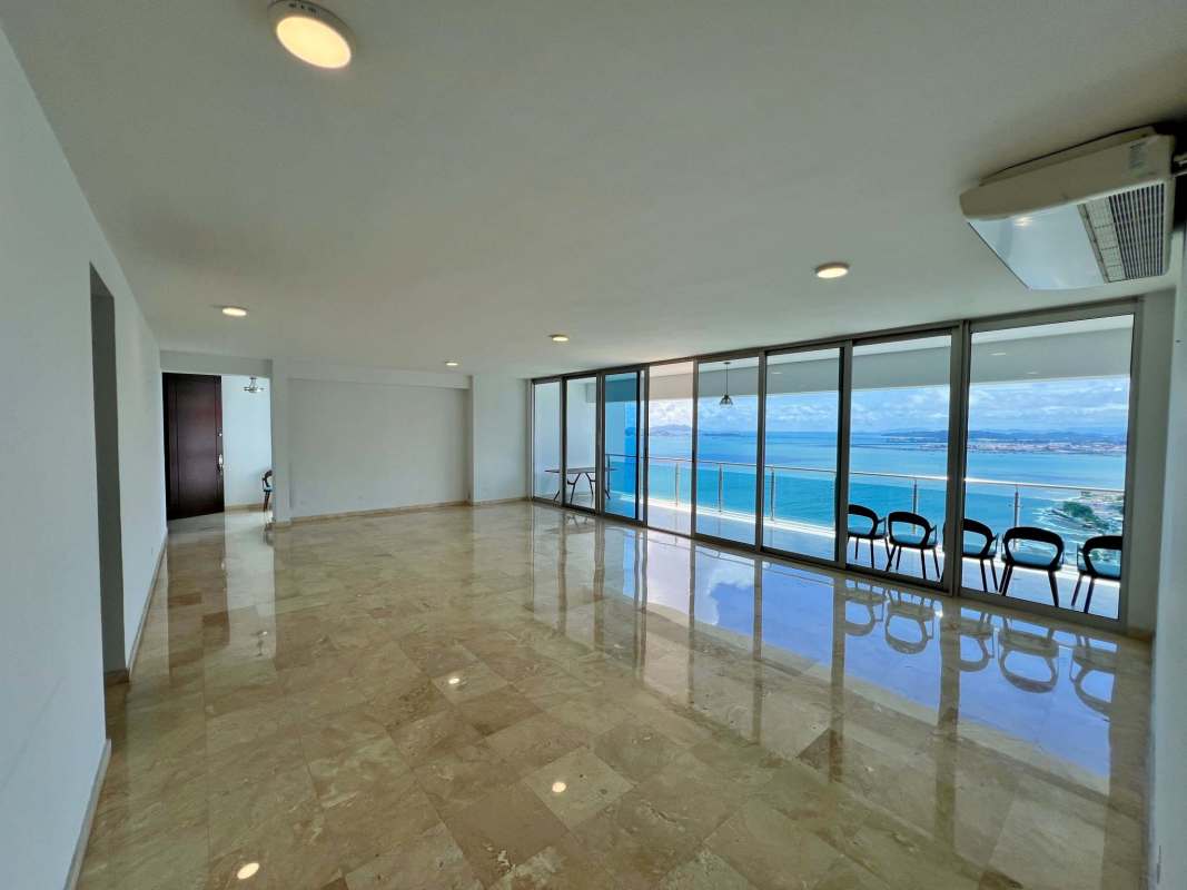 Balcony with glass railing overlooking Pacific Ocean PH Aqualina luxury condo Panama City
