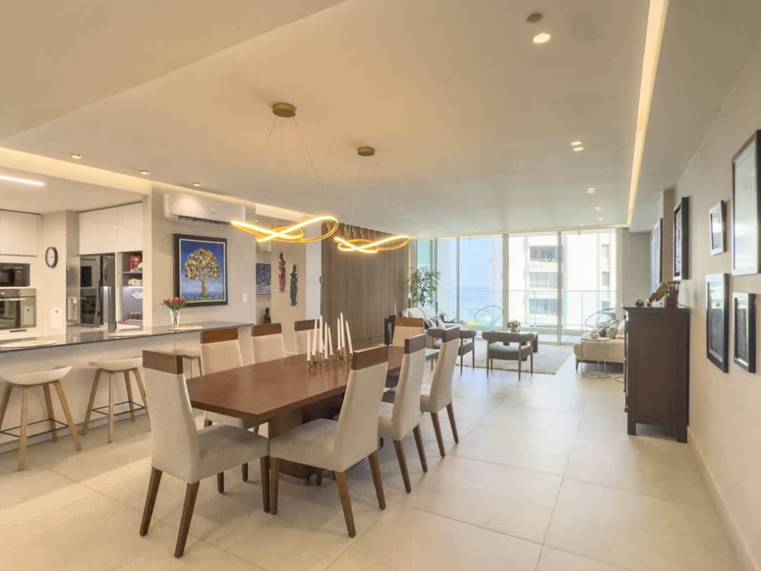 Laundry room with washer dryer and large window city view in PH Riviera del Golf Panama City