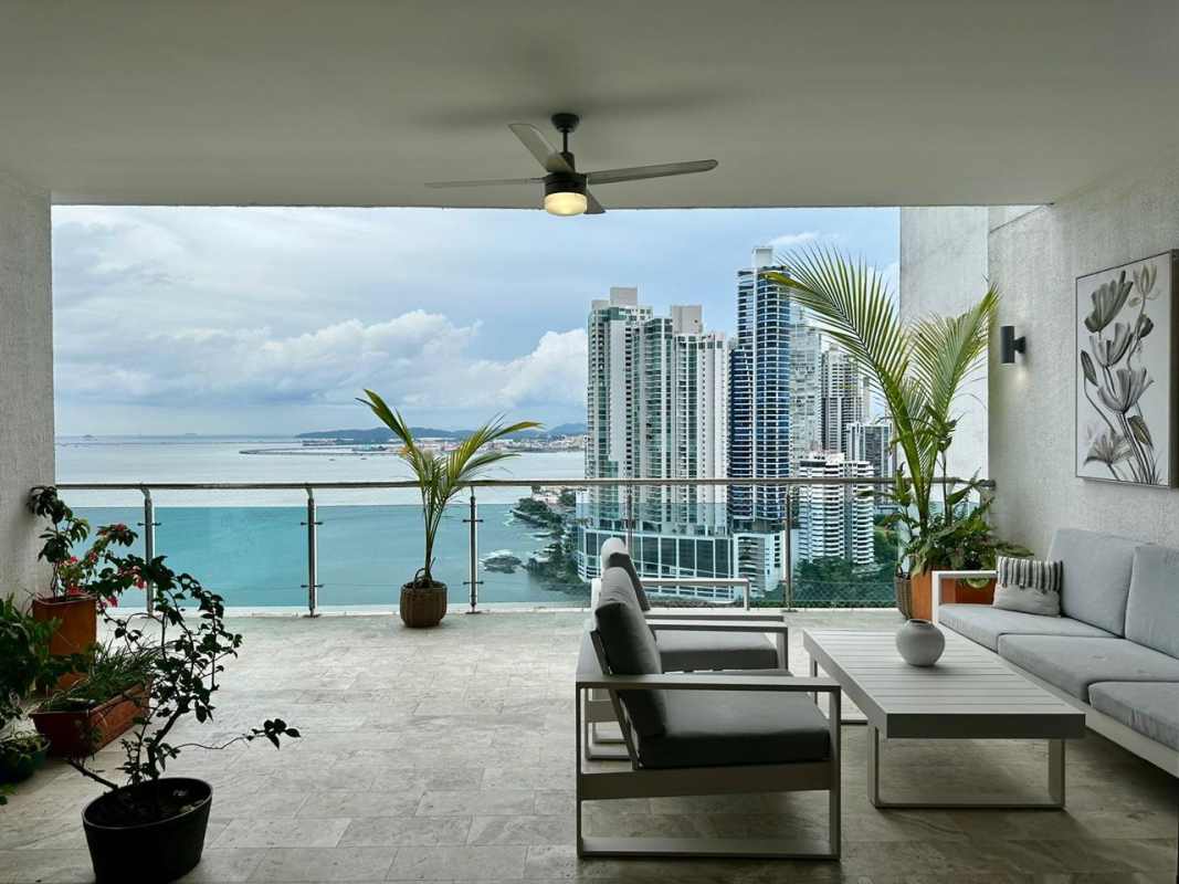 Spacious terrace with outdoor seating offering ocean and marina panoramas at PH Aqualina Panama City