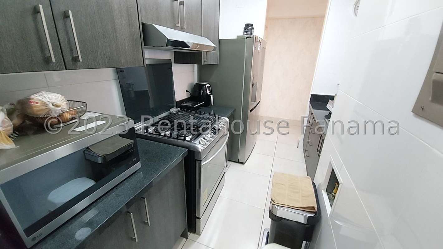 Open living dining area with balcony city view Sky Point Tower Betania Panama