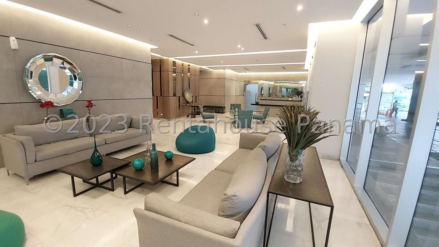 Contemporary kitchen with granite countertops and stainless appliances in Sky Point Tower Panama