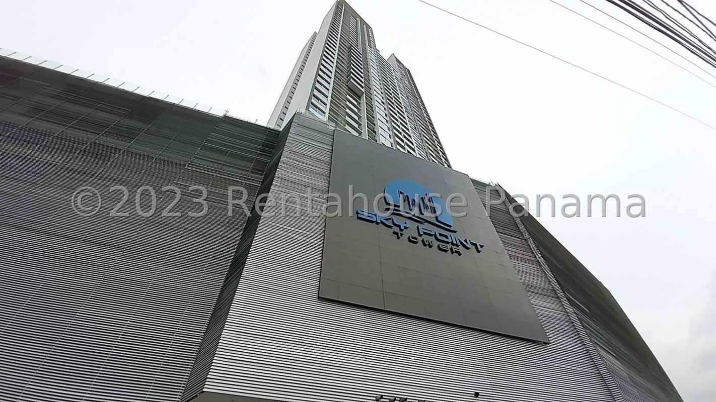 Elegant lobby with modern decor and seating at Sky Point Tower Betania Panama