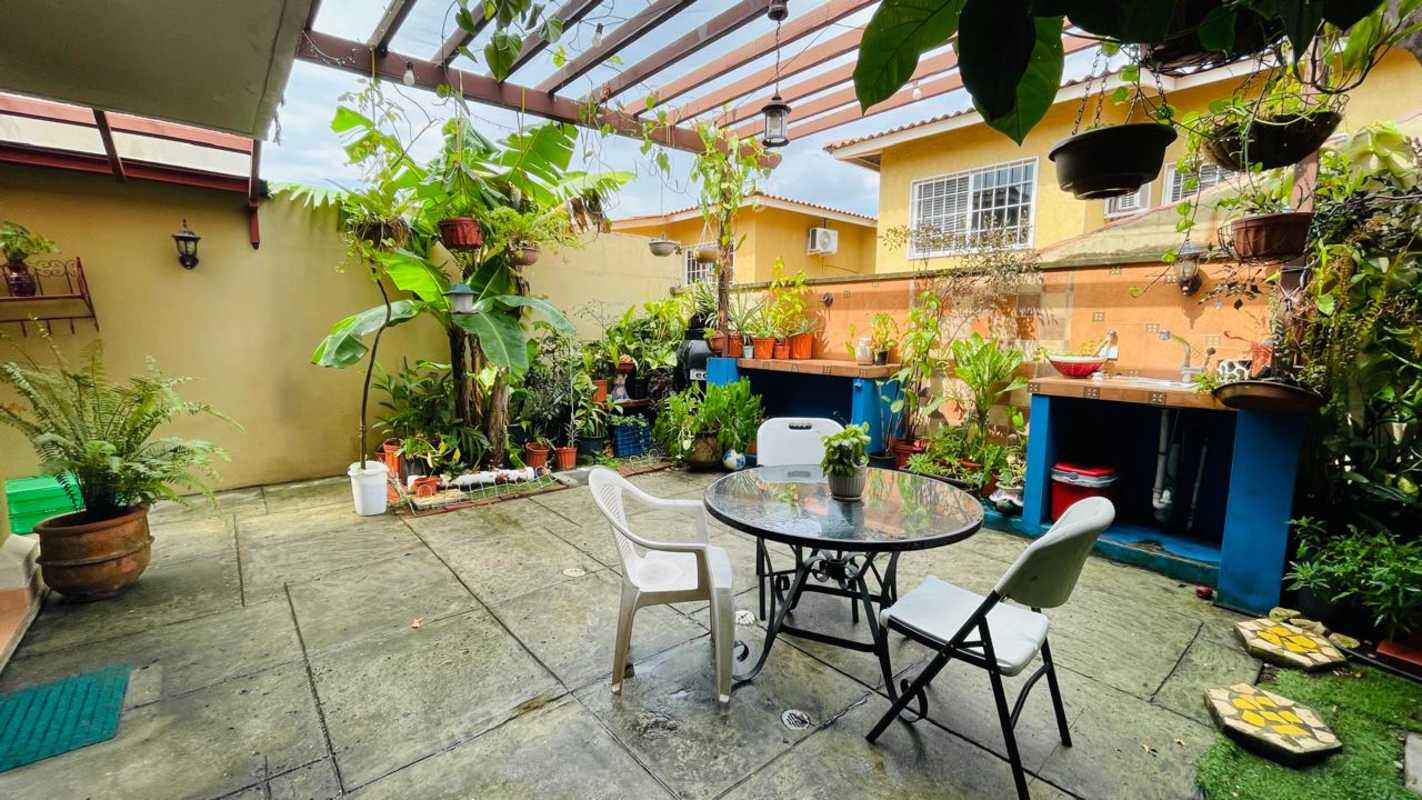 Spacious terrace with pergola, green garden, BBQ area at Dorado Lake Condado del Rey Panama City
