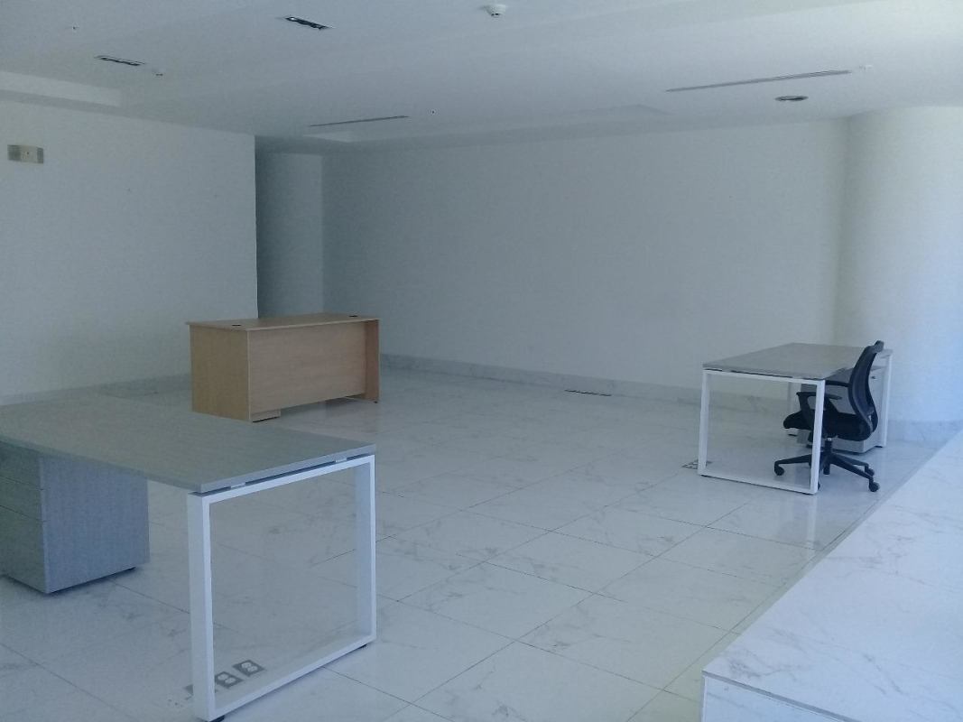 Bright corner office space with marble floors and city views in Oceania Business Plaza Panama City