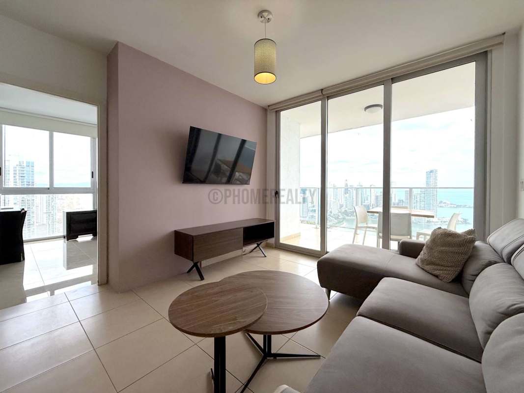 Luxury master bedroom with city skyline and ocean views balcony in PH BICSA Financial Center Panama City