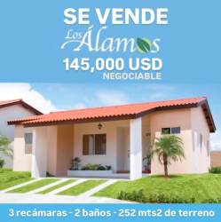 Single-story Mediterranean style house with red tiled roof and garden in Álamos Arboledas La Chorrera Panama