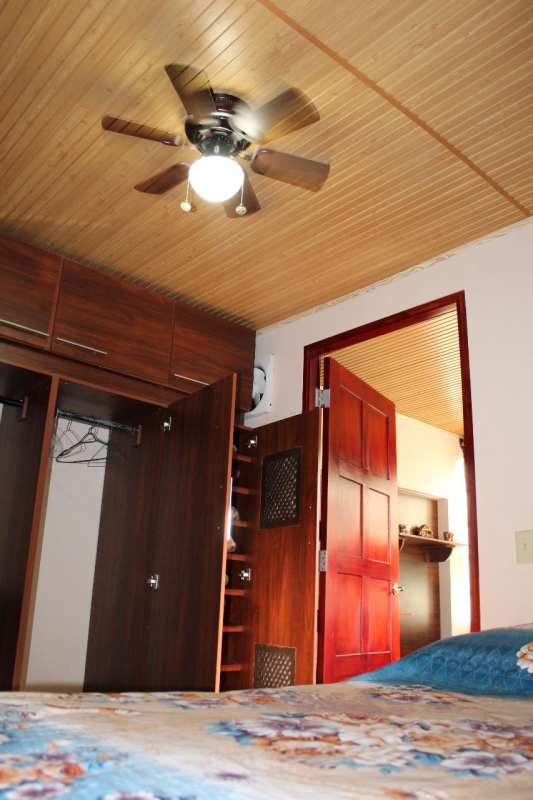 Open plan living and dining area of furnished studio at Condado Gardens Condado del Rey