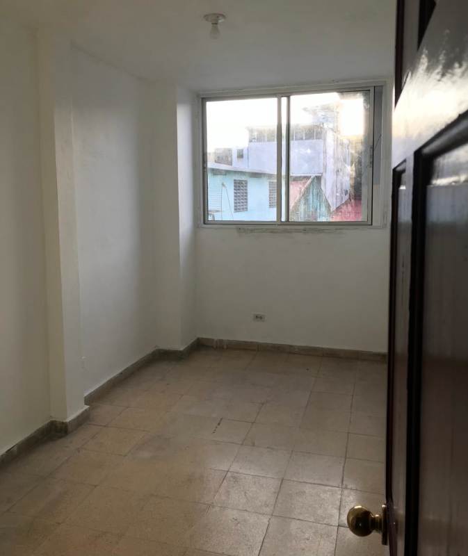 Bright bedroom with tile floor and window rental apartment PH Avenida B Santa Ana Panama City