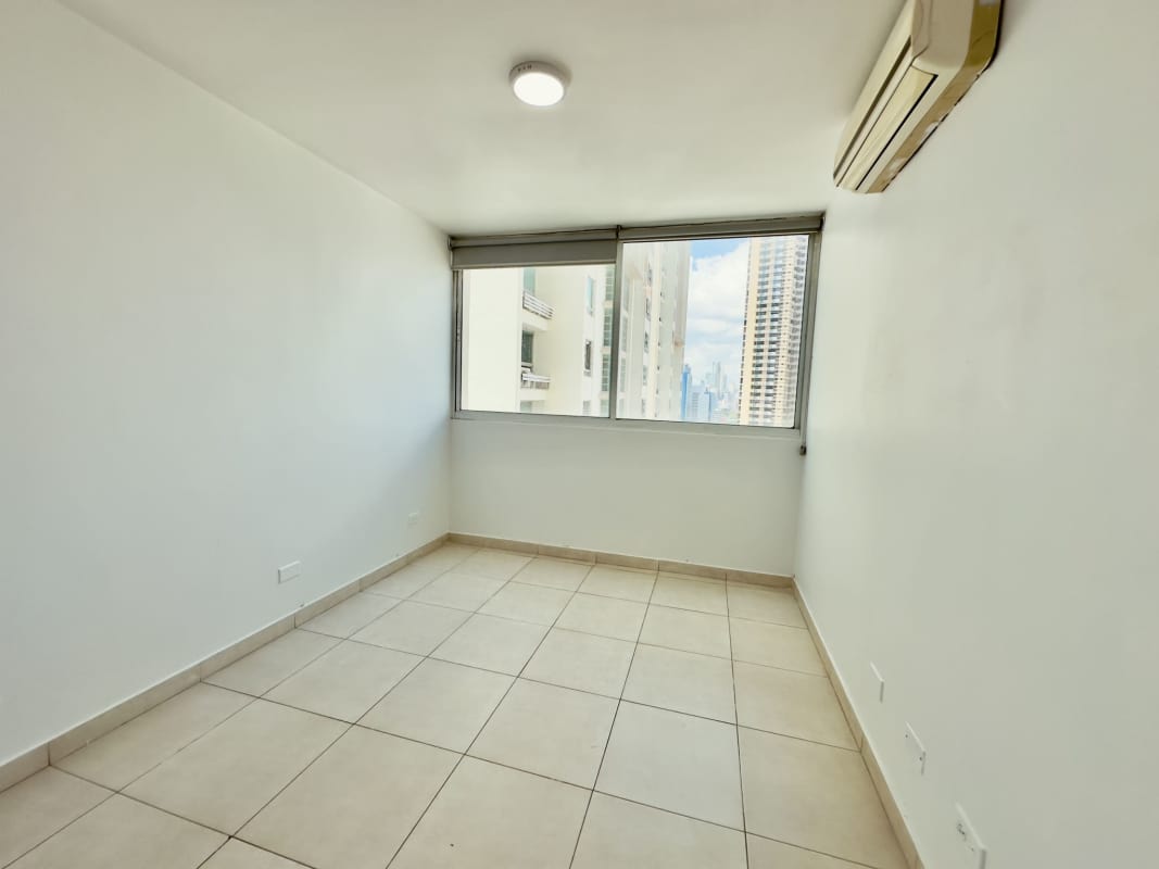 Bright living dining room with ocean view balcony access at PH Terramar San Francisco Panama