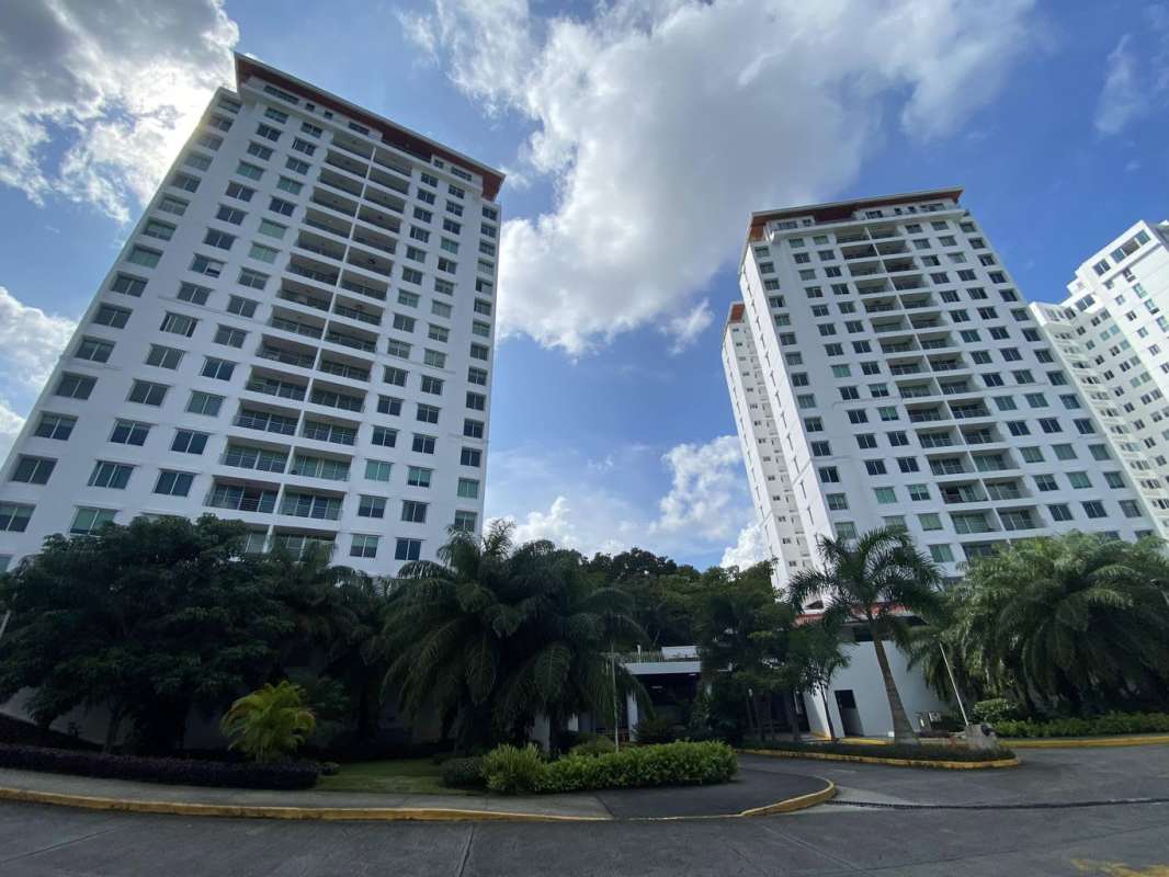 Spacious living room with large sliding doors opening to balcony at PH Albrook Court Clayton Panama