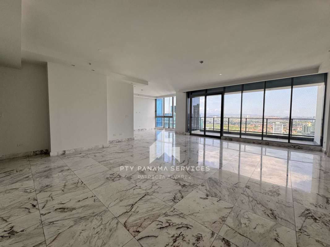 Spacious open living dining with marble floors and large windows at PH Regalia in Costa del Este Panama