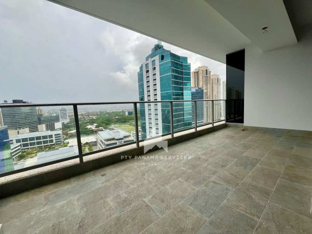 Modern gym with cardio equipment and panoramic windows at PH Regalia Costa del Este