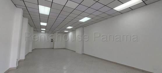 Empty retail or office commercial interior with ceramic tiles, white walls, and lighting Plaza La Chorrera Panama
