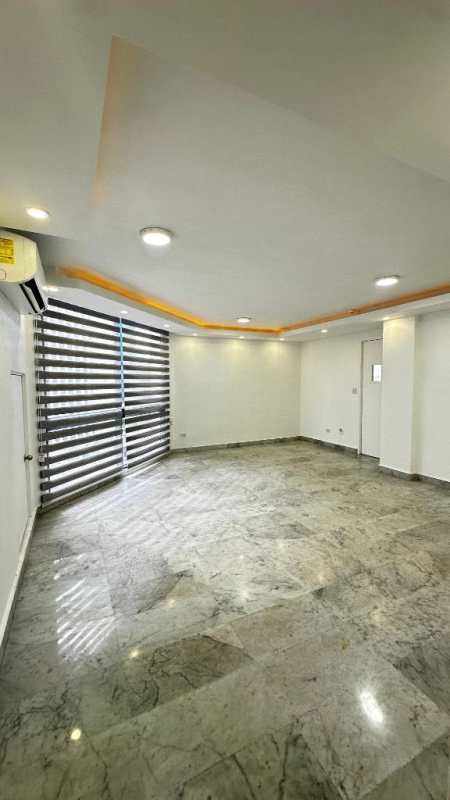 Modern bathroom with marble tiles, glass shower enclosure PH Vista Tower Panama City
