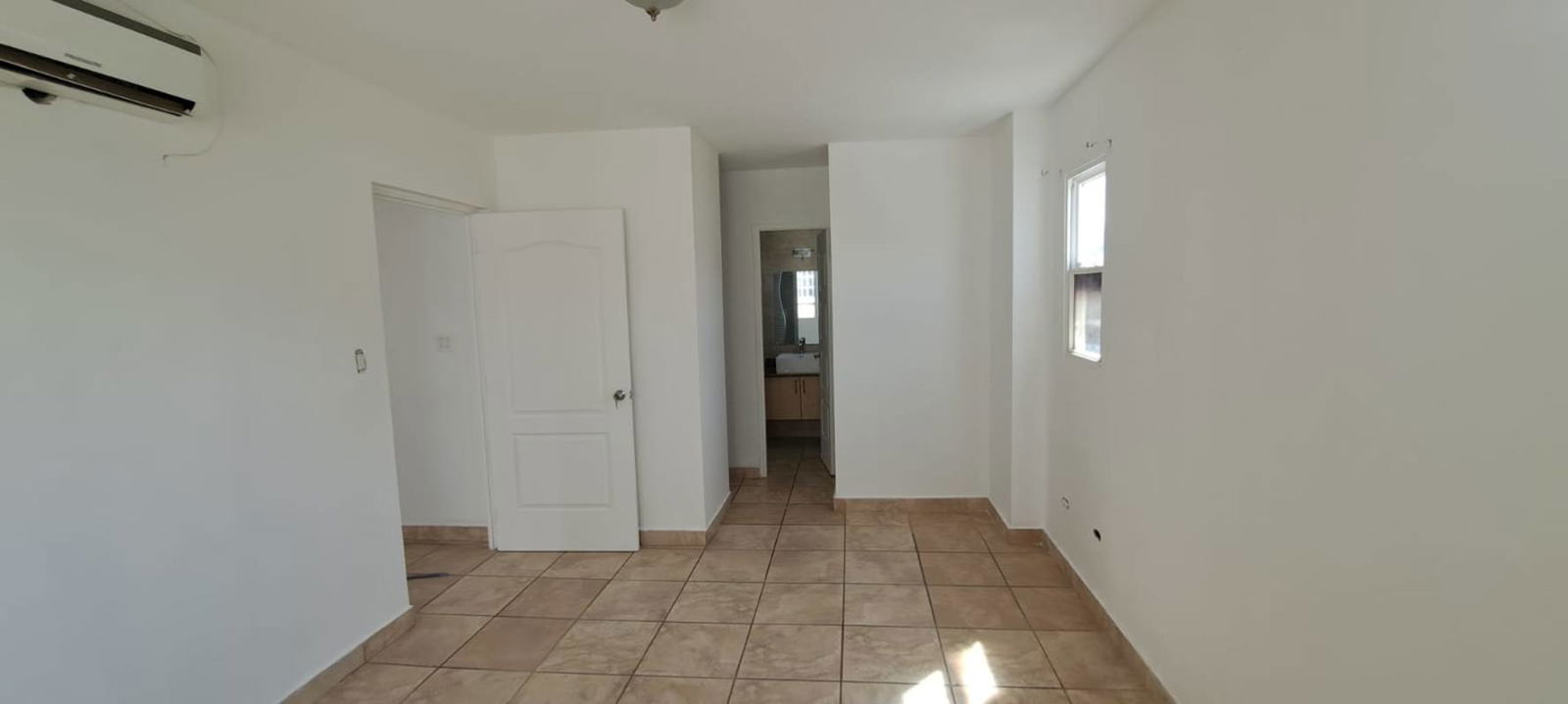 Exterior modern house facade white door tiled steps PH Everest Panama