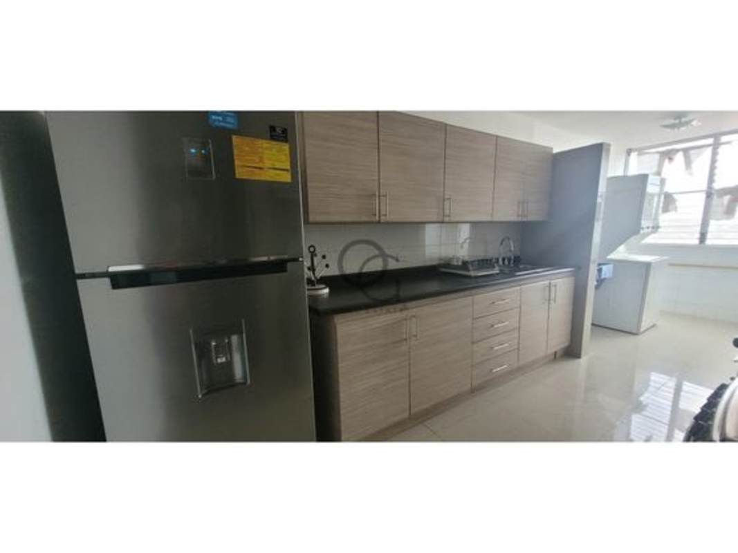 Modern bathroom with vessel sink, bidet spray, tile walls in Panama City