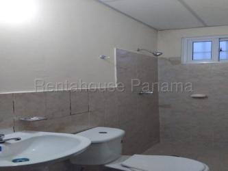 Bathroom with ceramic tiles, shower and sink in house La Chorrera Panama