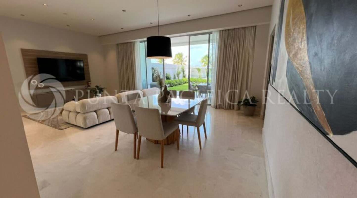 Upscale master bedroom featuring large window with views, luxury finishes at Beach Club Residences Panama