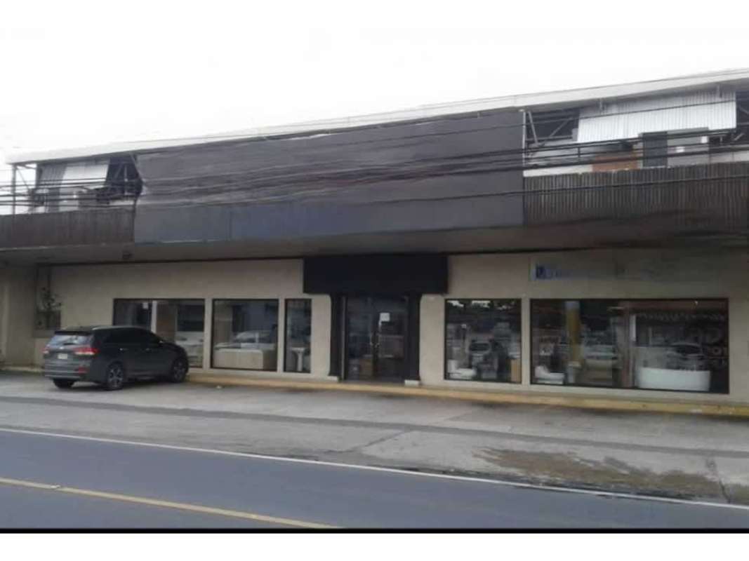 Street view of commercial property with large showroom windows and parkingon Avenida Santa Elena Panama