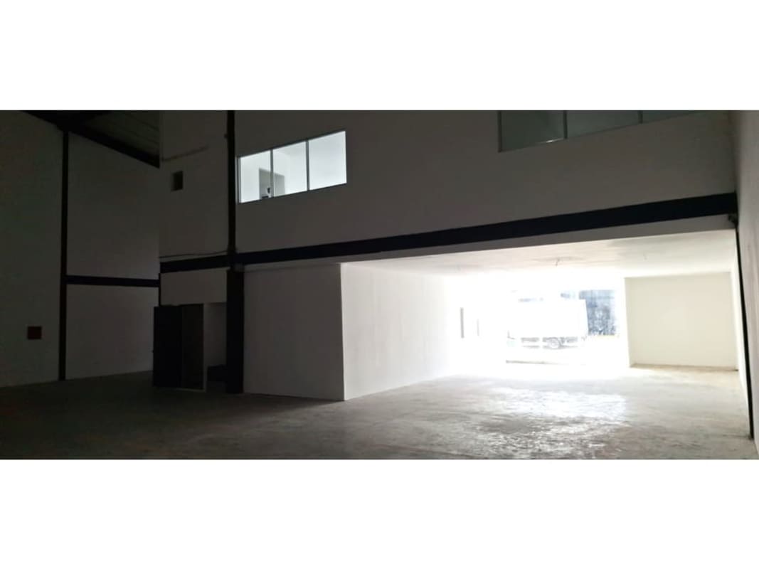 Empty warehouse interior with mezzanine office space warehouse Panama