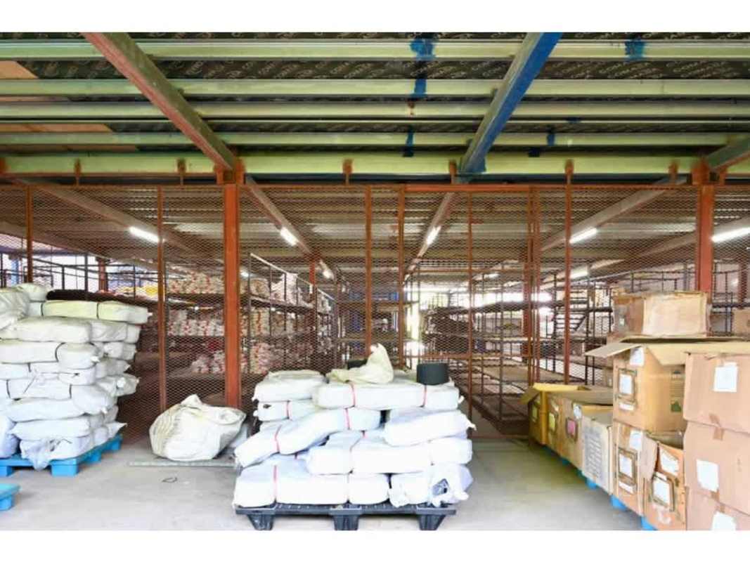 Partitioned warehouse storage area with shelves and fencing in Pueblo Nuevo Panama