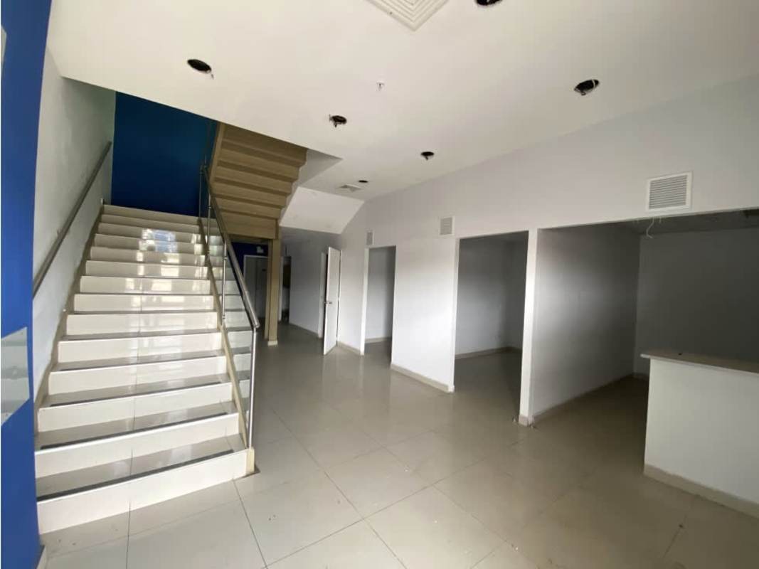 Reception or lobby with glass staircase mezzanine access warehouse Villa Zaita Panama