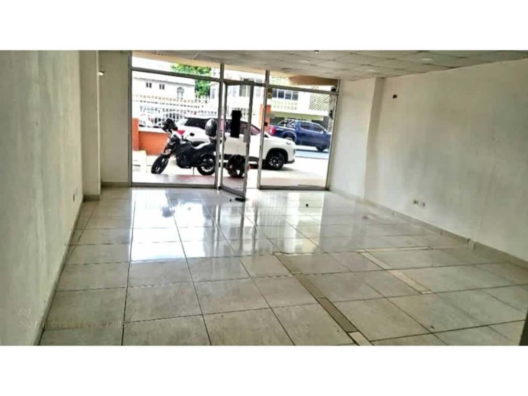 Empty commercial space with glass storefront, tiled floor, and white walls on Vía Porras San Francisco Panama