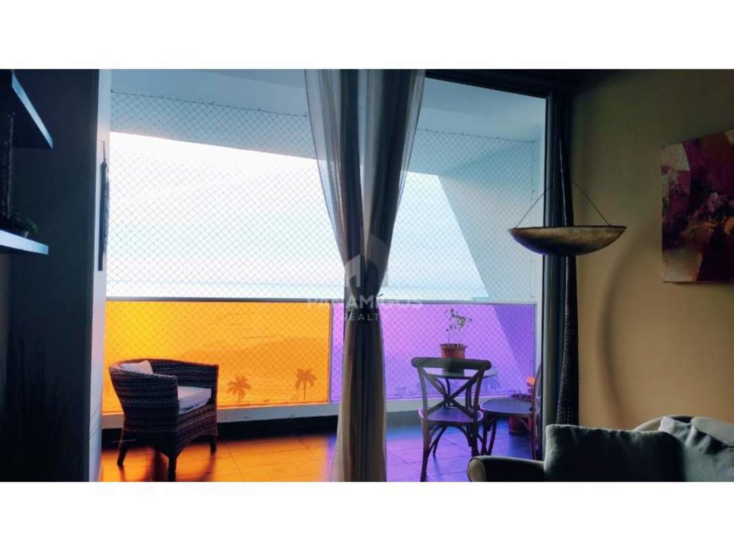 Open concept dining and living room with ocean view windows PH Element Panama