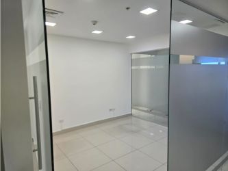 Private glass-walled conference room with recessed lighting in Oceania Business Plaza Panama