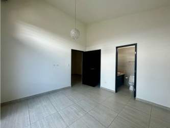 Family room upstairs with balcony view and hallway area PH Nativa Panama Pacifico