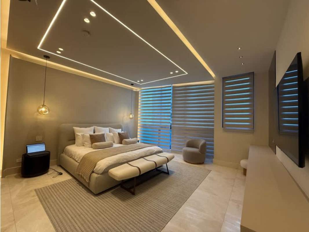 Spacious walk-in closet with modern custom cabinetry and storage PH Ocean Front Panama