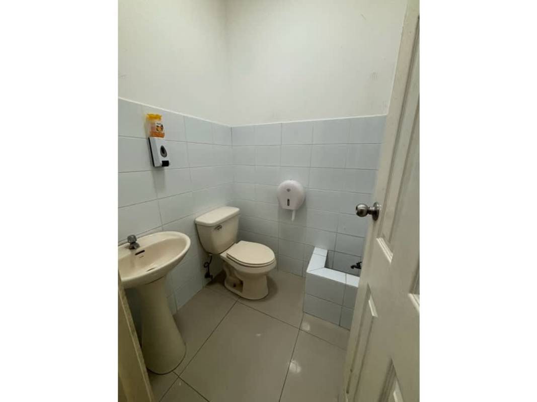 Unfurnished retail commercial locale tiled floors and storefront windows Plaza El Dorado Panama