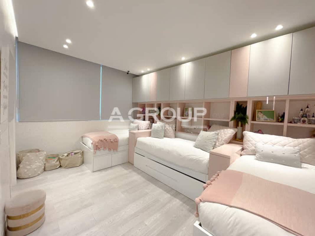 Children’s bedroom with multiple beds and modern storage at Aventura Tower Panama