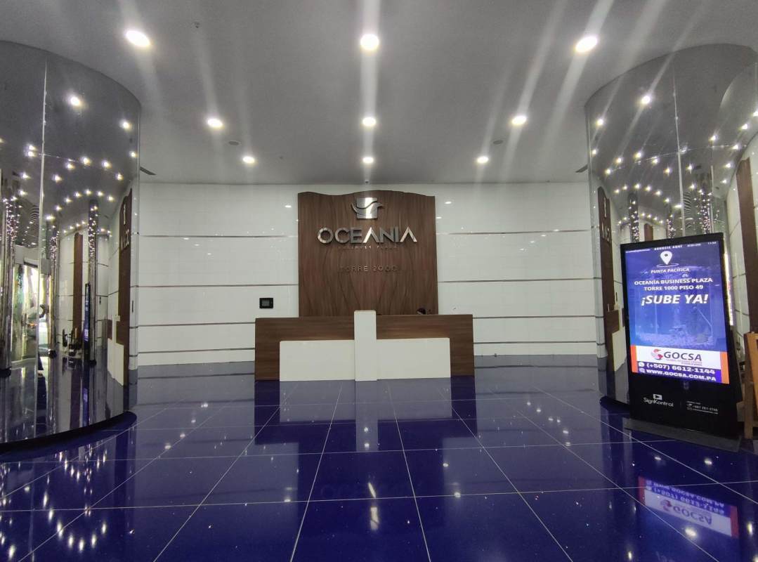 Reception area with signage digital directory Oceanía 2000 lobby Panama