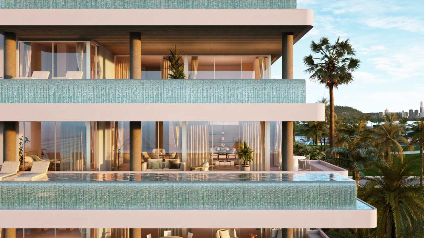 Modern high-rise with private pool balconies overlooking Ocean Reef Island Panama City