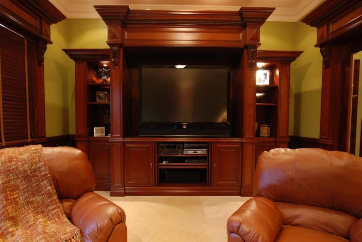 Elegant traditional wood paneled home office with luxury finishes in Costa del Este Panama