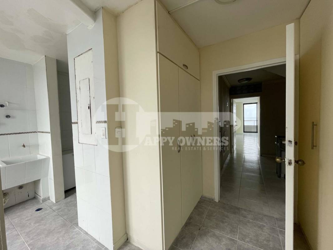 Curved balcony view with city skyline and waterfront Panama City PH La Ensenada