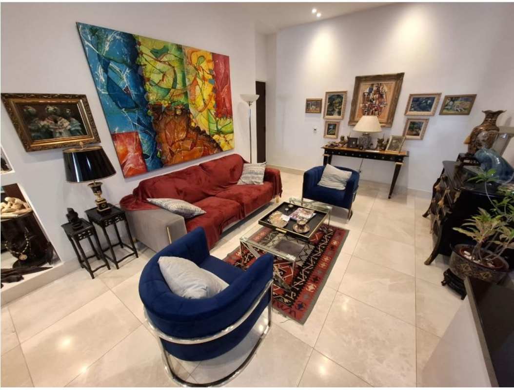 Spacious living room with marble floors modern art furnishings PH Park City Obarrio Panama