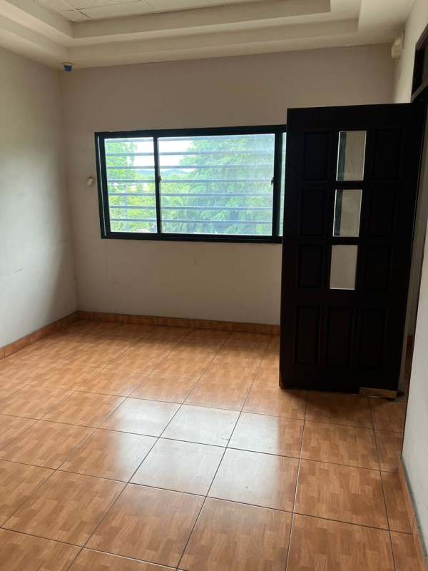 Main reception area with glass doors barred windows tiled floor Las Mañanitas