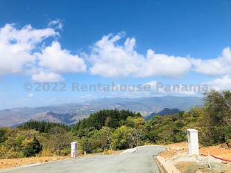 Paved curved road in mountain residential area Chicá Sorá with lush views