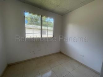 Empty bedroom with tiled flooring and window in Quintas del Pacífico house for sale in La Chorrera Panama