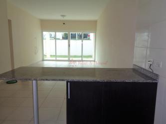 Living and dining area with natural light in house for sale La Chorrera