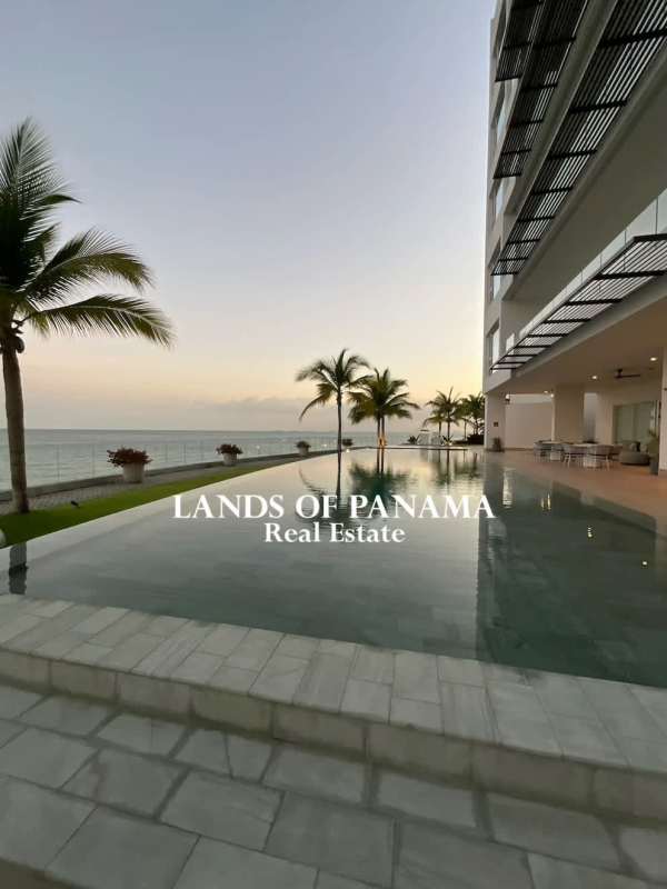 Contemporary kitchen with Italian cabinetry, marble floors, and island at Ocean Reef Panama