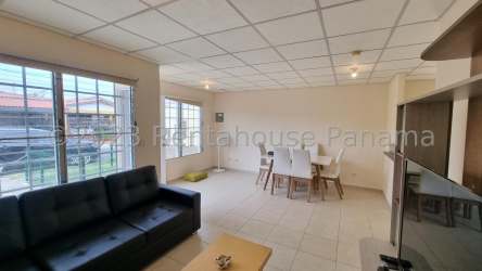 Bedroom with window, wardrobe, and tile floor in house Montelimar La Chorrera