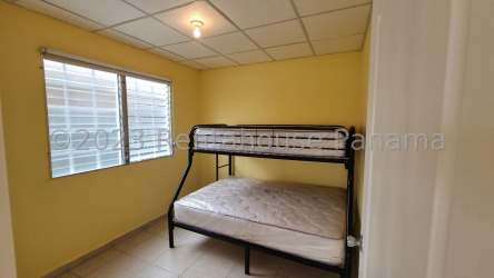 Bright open-plan living dining area in house at Montelimar La Chorrera with tiled floor