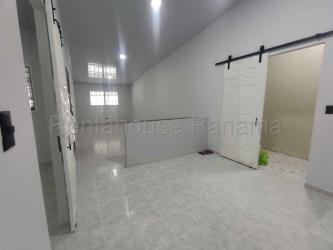 Spacious backyard with partial covered patio and wall fence in Villas de Arraiján